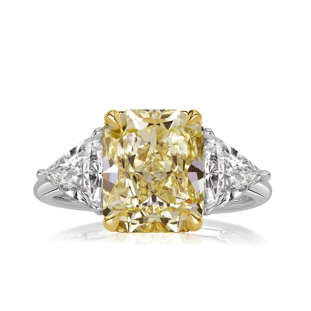 Fancy Color Diamonds: A Collector's Guide 2. 4-Carat Radiant Cut Fancy Yellow Diamond Ring | GIA Certified
