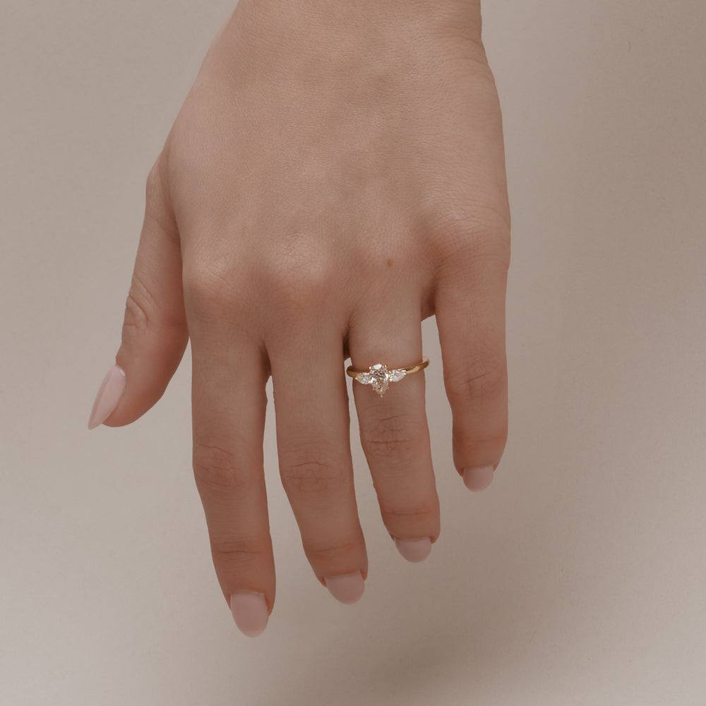 0-67ct-pear-champagne-amira-7-250-00-front-view-primary.jpg 0.67 Carat Pear Statement | Champagne | 14K White Gold | Pure Sophistication | Heirloom - Image 1