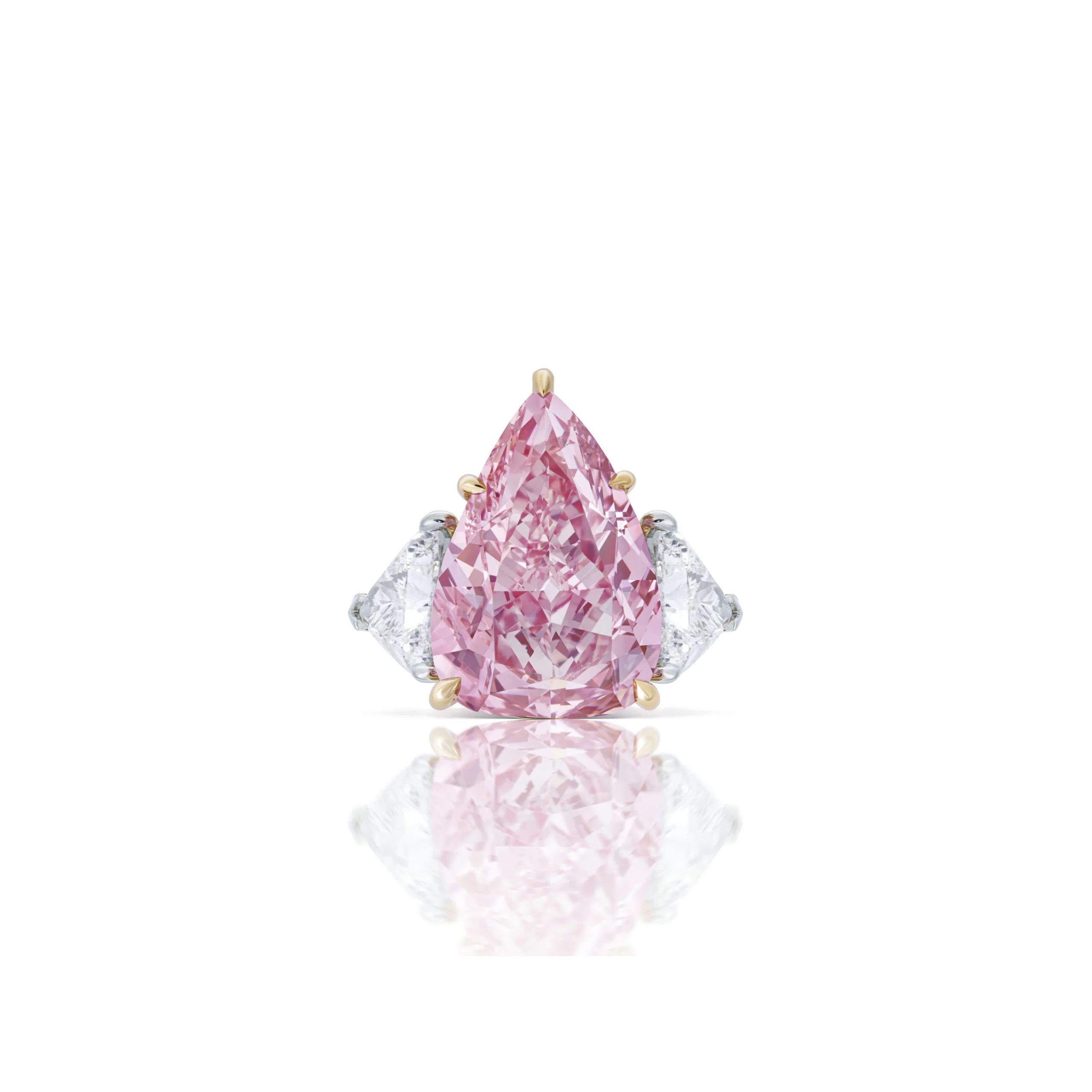 The Pink Paradox: Rarer Every Year, Wanted More 2. 10 carat fancy pink pear cut diamond ring