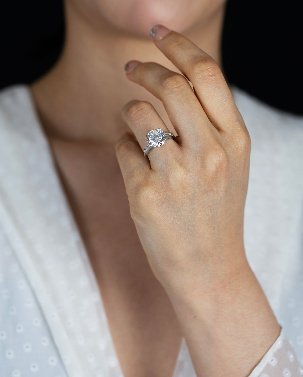 134000-gia-certified-4-16-carats-round-brilliant-cut-diamond-three-stone-engagement-ring-in-platinum-front-view-primary.jpg 4.16 Carat Round Brilliant Diamond Ring | Brilliant White | 18K Gold | Modern Nobility - Image 1