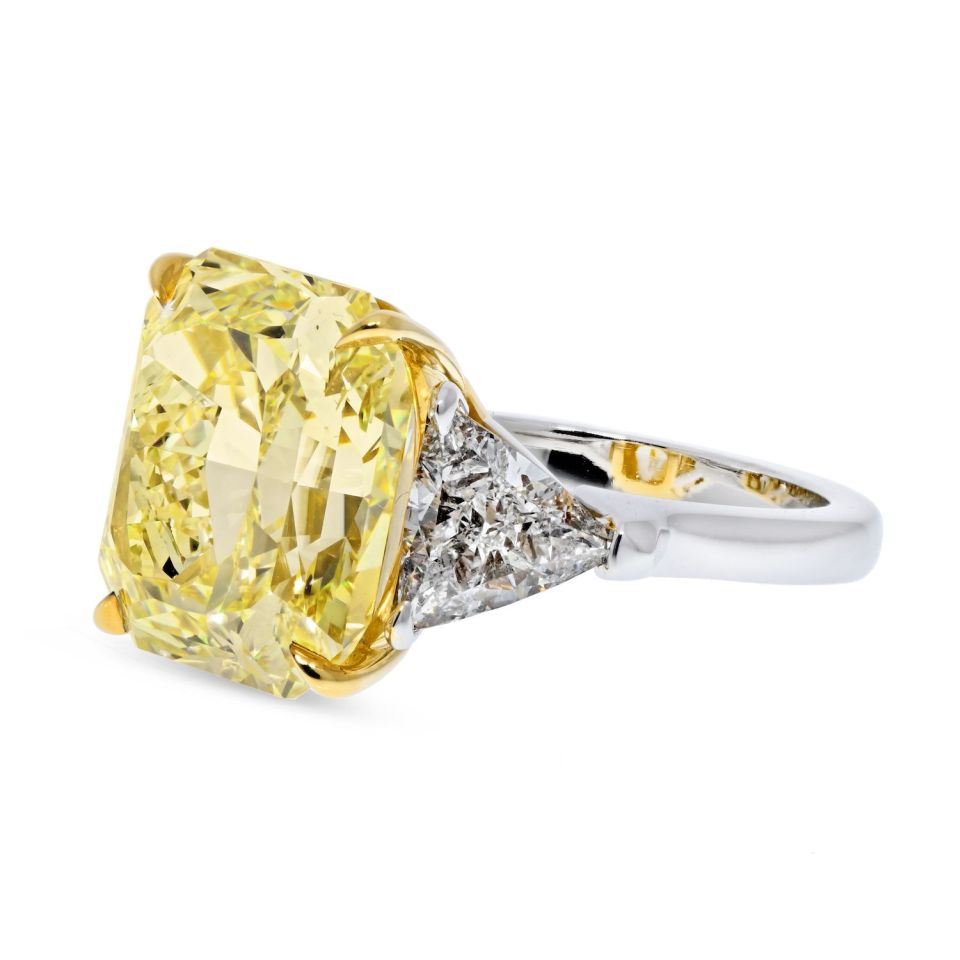 175000-0-78-carat-trillian-diamond-e-gia-10-98-carat-radiant-cut-fancy-yellow-vvs2-ring-front-view-primary.jpg 0.78 Carat Radiant Statement | Fancy Yellow | VVS2 | 14K White Gold - Image 1