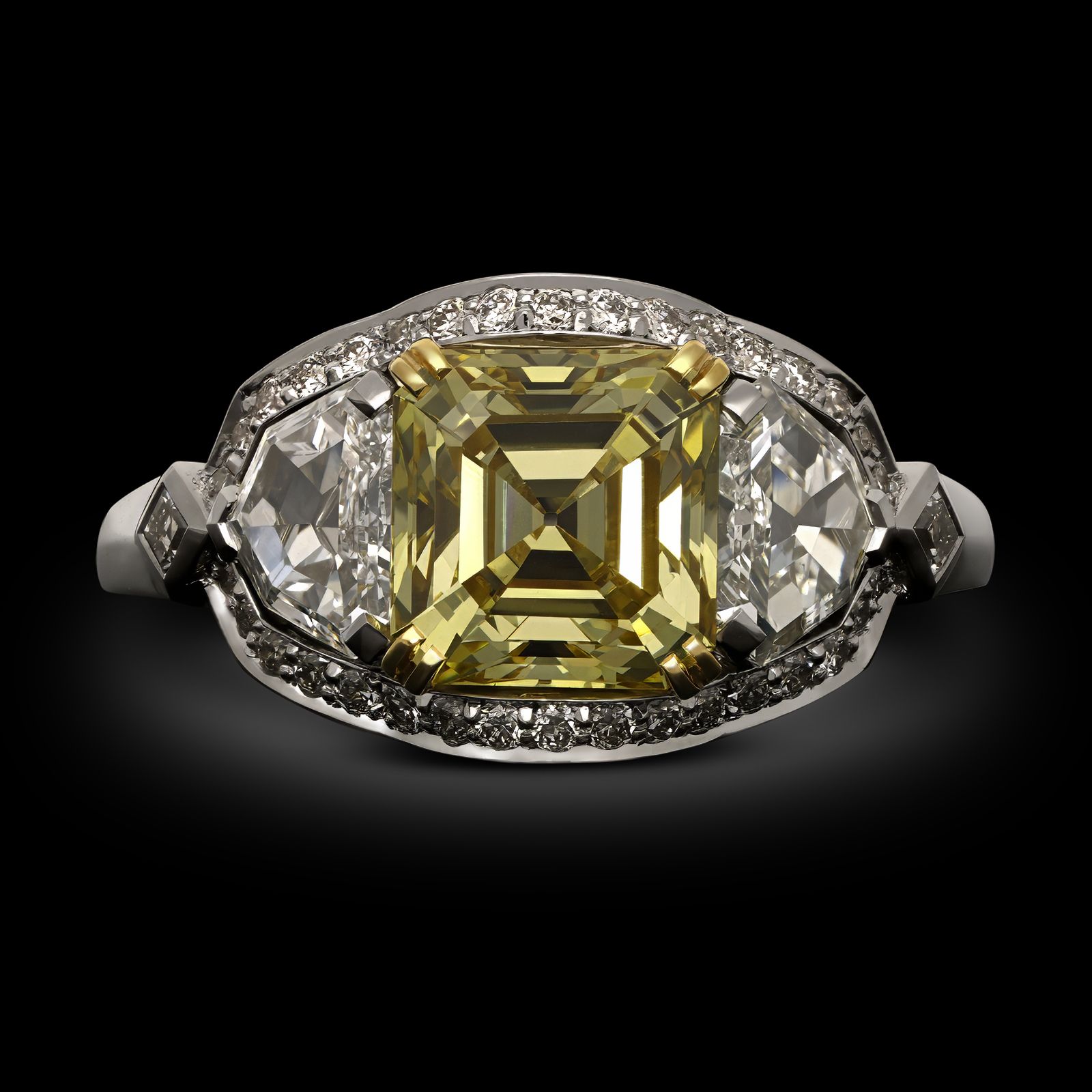 50000-2-12ct-fancy-intense-yellow-asscher-cut-diamond-three-stone-ring-front-view-primary.jpg 2.12 Carat Asscher Diamond Ring | Fancy Yellow | 14K White Gold | Sunlit Royal Radiance - Image 1