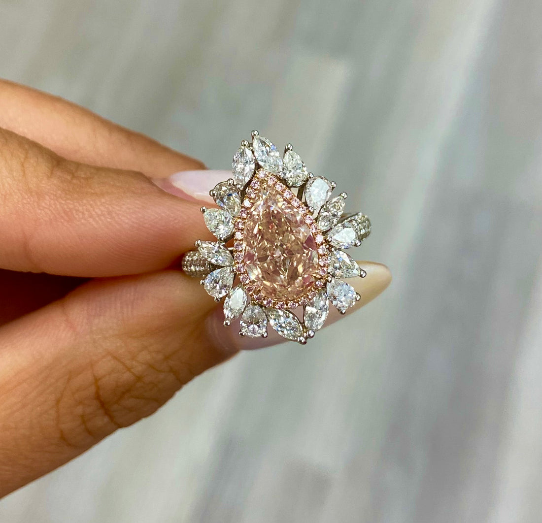 75000-2-5-carat-pear-shape-peach-diamond-ring-front-view-primary.jpeg 2.5 Carat Pear Statement | Fancy Yellow | 14K White Gold | Sunlit Royal Radiance | Heirloom - Image 1