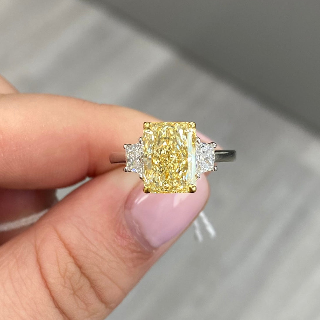 75000-3-14ct-fancy-light-yellow-elongated-radiant-flawless-diamond-ring-front-view-primary.jpeg 3.14 Carat Radiant Statement | Fancy Yellow | FL/IF | 14K White Gold - Image 1