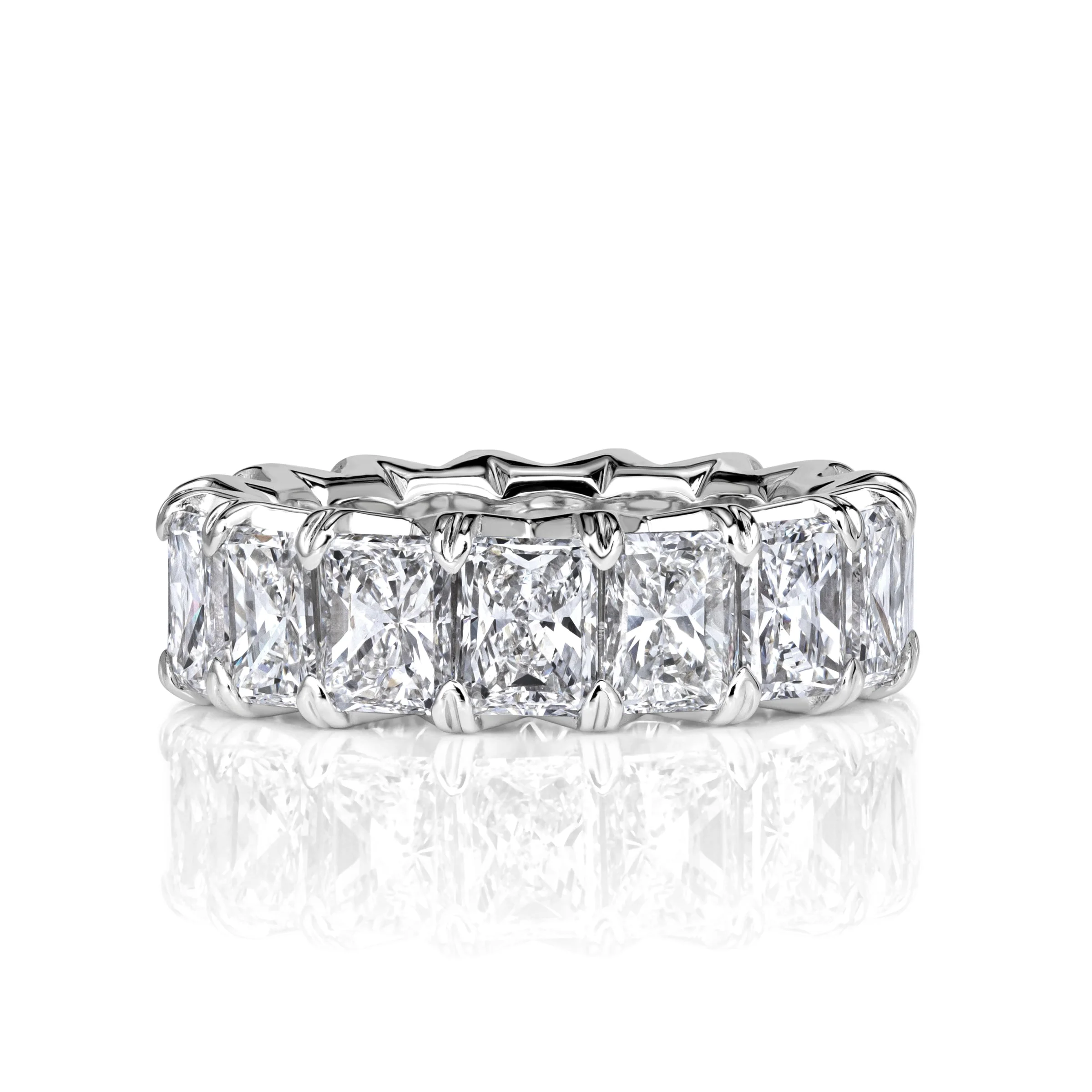 How a Ring Holds Its Stone: A Field Guide to Settings 7. Radiant cut diamond eternity band in white gold, full circle of stones
