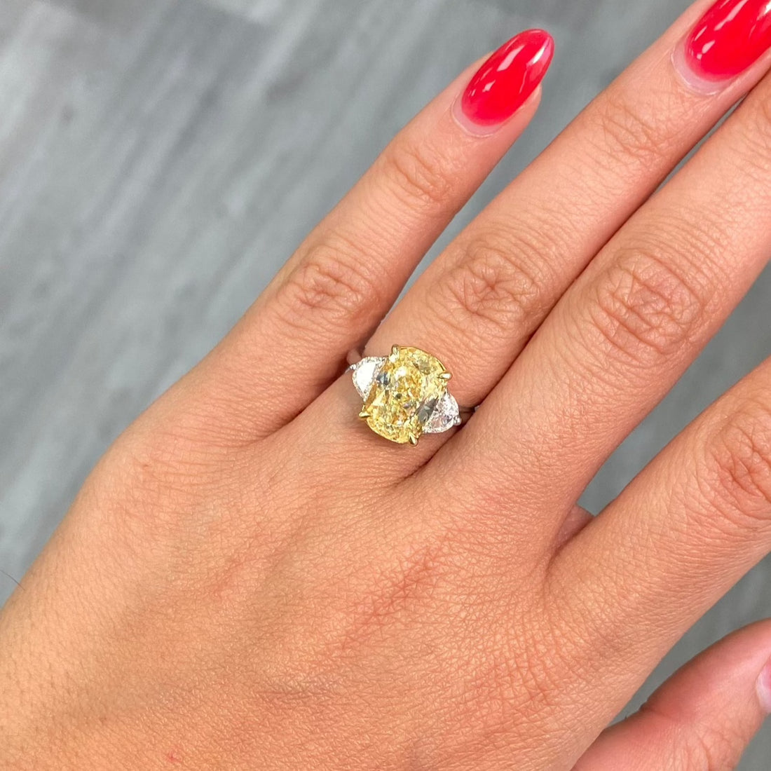 95000-5ct-light-yellow-oval-halo-diamond-engagement-ring-front-view-primary.jpeg 5 Carat Oval Halo Diamond Ring | Fancy Yellow | 14K White Gold | Rare Fancy-Color Splendour - Image 1