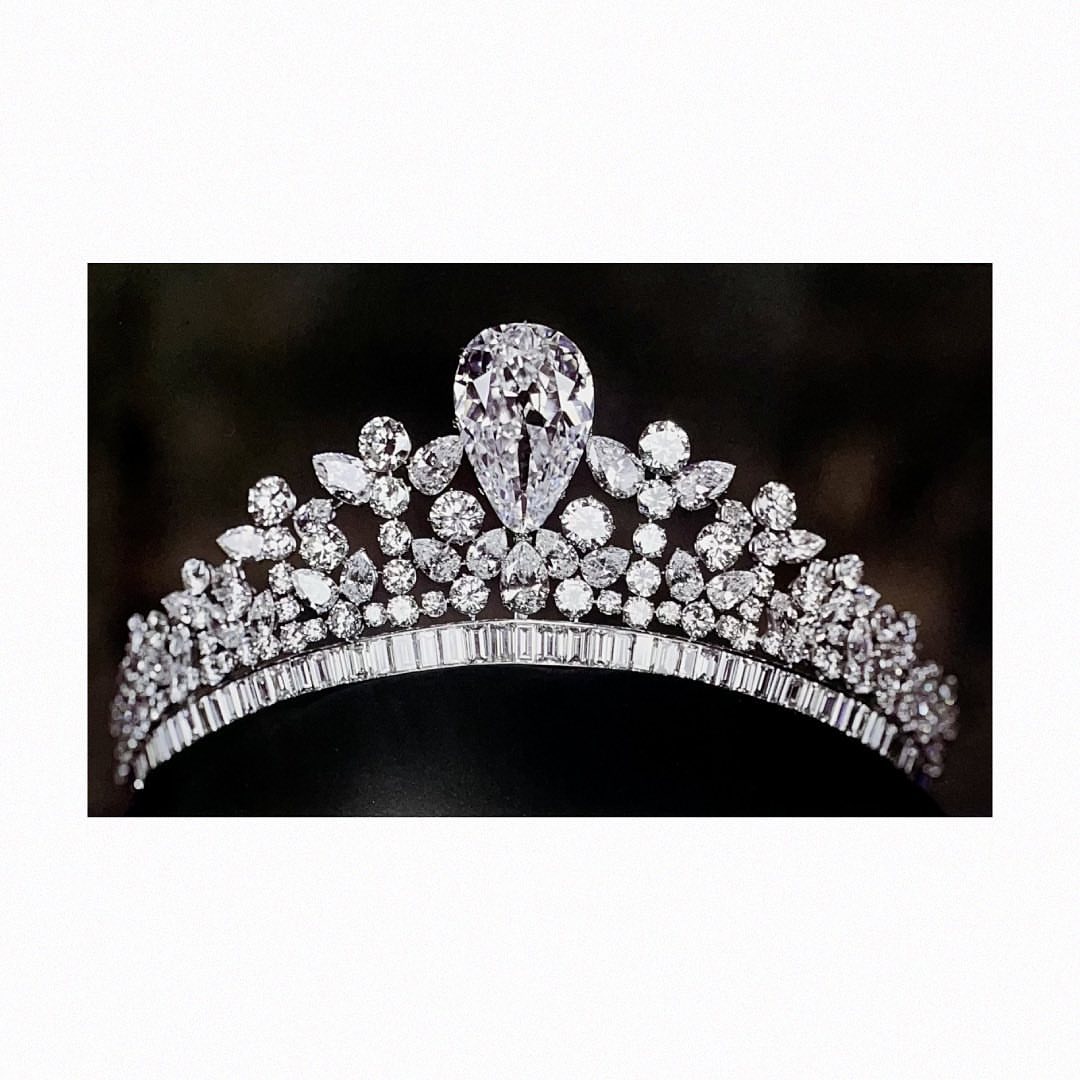 Platinum diamond tiara with large pear-shaped centre diamond, pear marquise round and baguette cuts on baguette base