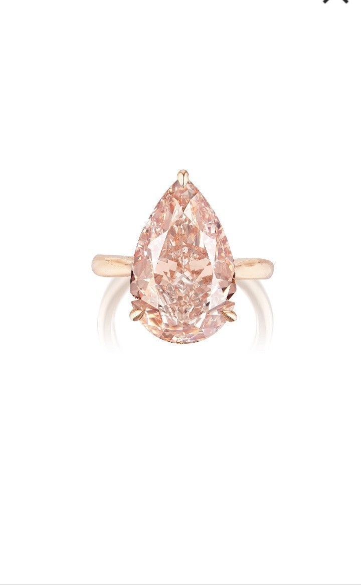 14.60 carat Fancy Brownish Orangy Pink Pear Diamond in rose gold ring setting