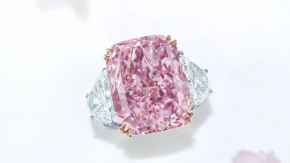 The Pink Paradox: Rarer Every Year, Wanted More 3. Detail of a 4.09 carat fancy purplish pink radiant cut diamond ring