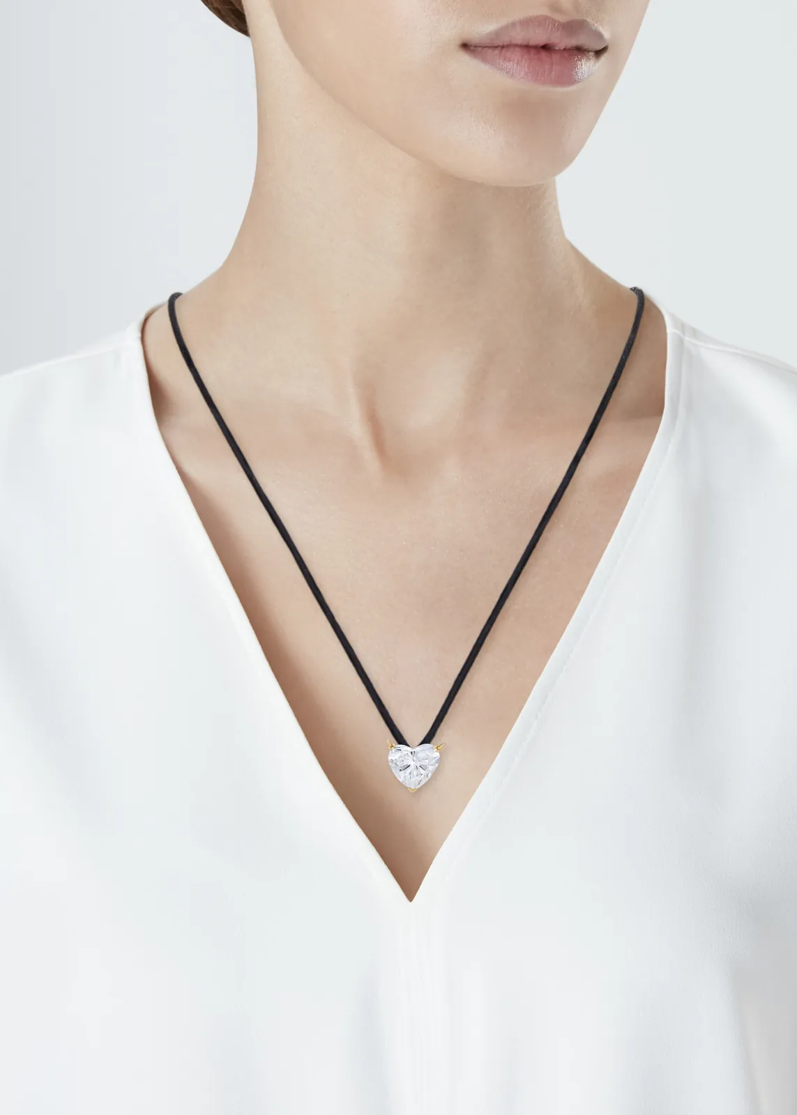 10.73 carat heart shaped diamond pendant in yellow gold, D colour VVS clarity