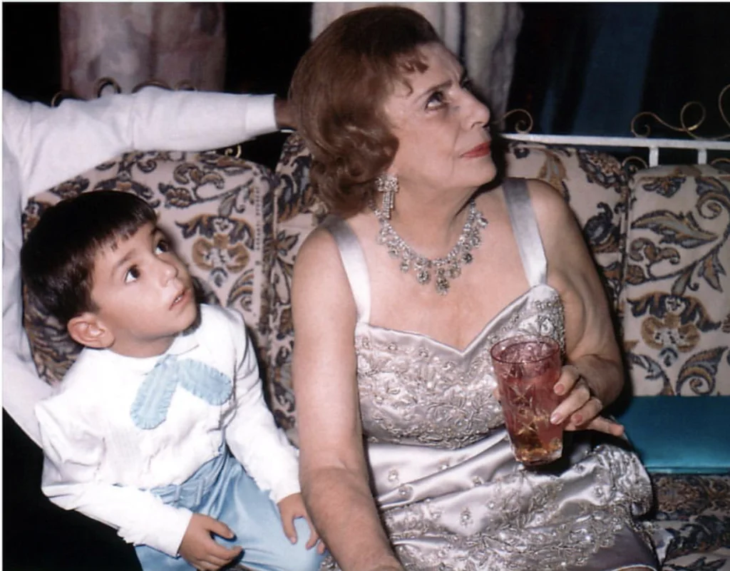 Queen Tadj ol-Molouk 1. Queen Tadj ol-Molouk with Crown Prince Reza