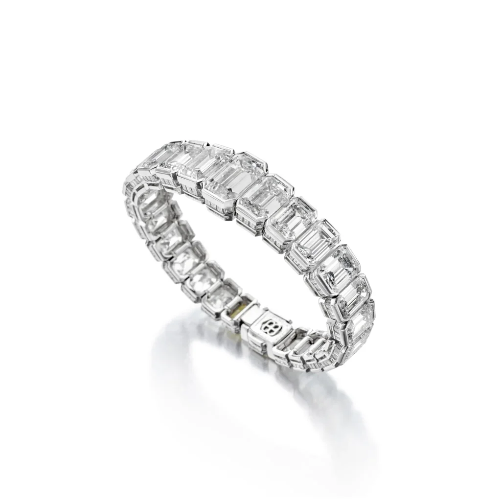 60 Carats | an Extraordinary Diamond Bracelet of Semi-flexible Design, Featuring 25 Emerald-cut Diamonds Weighing a Tota