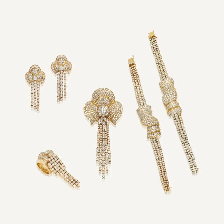 Diamond Suite, Comprising: Two Bracelets, Pair of Earrings, Ring and a Brooch, Circular-cut Diamonds