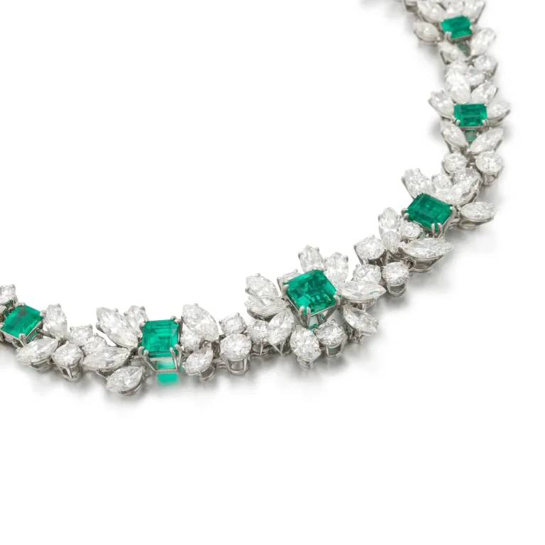 Emerald and Diamond Necklace and a Brooch| Designed As a Graduated Line of Flower Decorated with Step-cut Emeralds, Bril