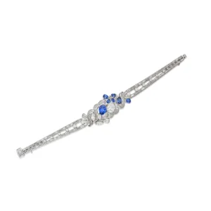 Sapphire and Diamond Bracelet | Designed with a Scroll Motif Centerpiece and Tapering Sides, Set with Pear- and Marquise