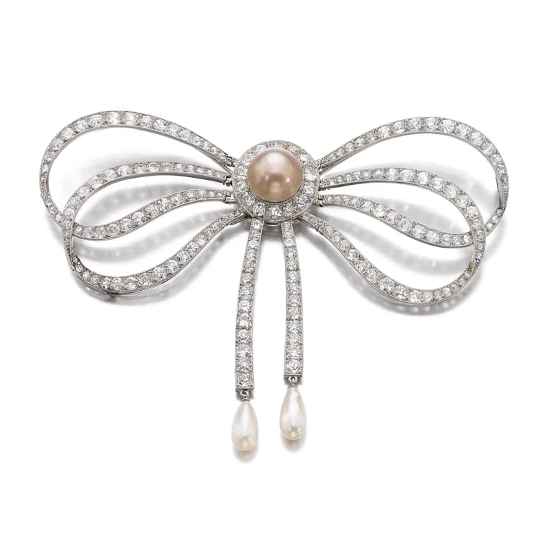 Diamond Brooch | of Bow Design, Set with a Button-shaped Natural Pearl of Light Brown Tint Measuring Approximately 11.80