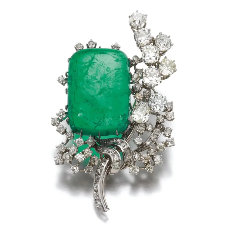 Emerald and Diamond Brooch | Claw-set with a Cushion-shaped Cabochon Emerald Weighing 62.92 Carats, Embellished with Cus
