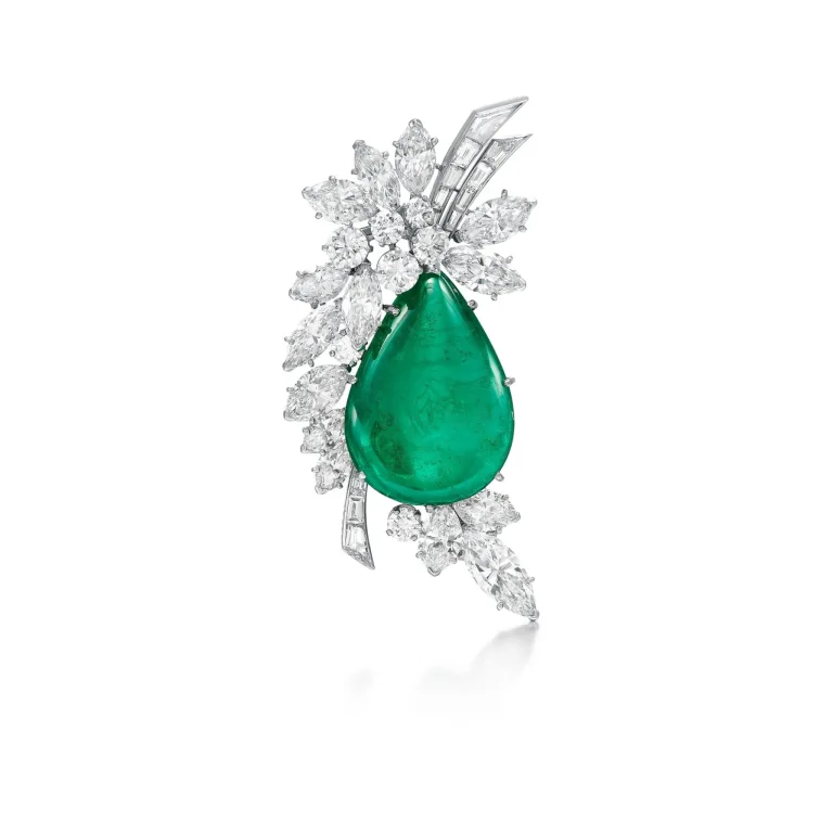 Emerald and Diamond Brooche | of Floral Design, Set with a Cabochon Emerald Weighing 39.11 Carats, Surrounded by Marquis