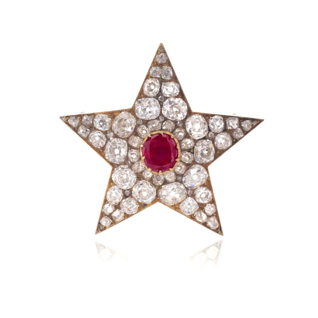 Ruby and Diamond Brooch, 1890s and Later Designed As a Star Set with a Cushion-shaped Ruby, Pavé-set with Cushion-shape