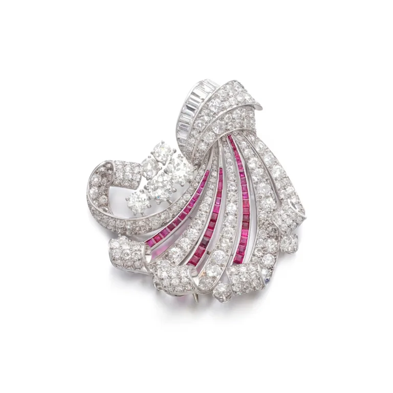Ruby and Diamond Brooch | of Scroll Design, Set with Circular-, Single-cut and Baguette Diamonds, Highlighted with Calib