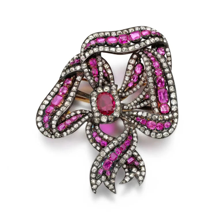 Ruby and Diamond Brooch Pendant | of Bow Design Set with Oval, Step- and Circular-cut Rubies, Framed with Circular-cut a