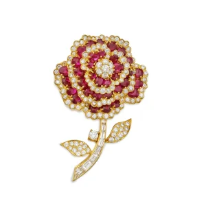 Ruby and Diamond Brooche | Designed As a Flower, Set with Oval-shaped Rubies and Round and Baguette Diamonds