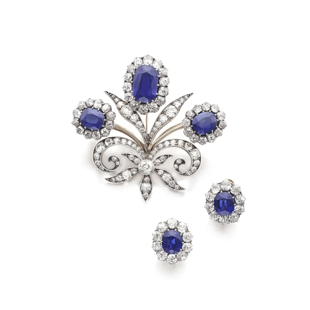 Sapphire and Diamond Demi-parure, | Comprising: a Brooch Designed As a Fleur-de-lys Set with Oval Sapphires Weighing 6.4