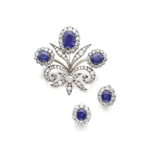 Sapphire and Diamond Demi-parure, | Comprising: a Brooch Designed As a Fleur-de-lys Set with Oval Sapphires Weighing 6.4