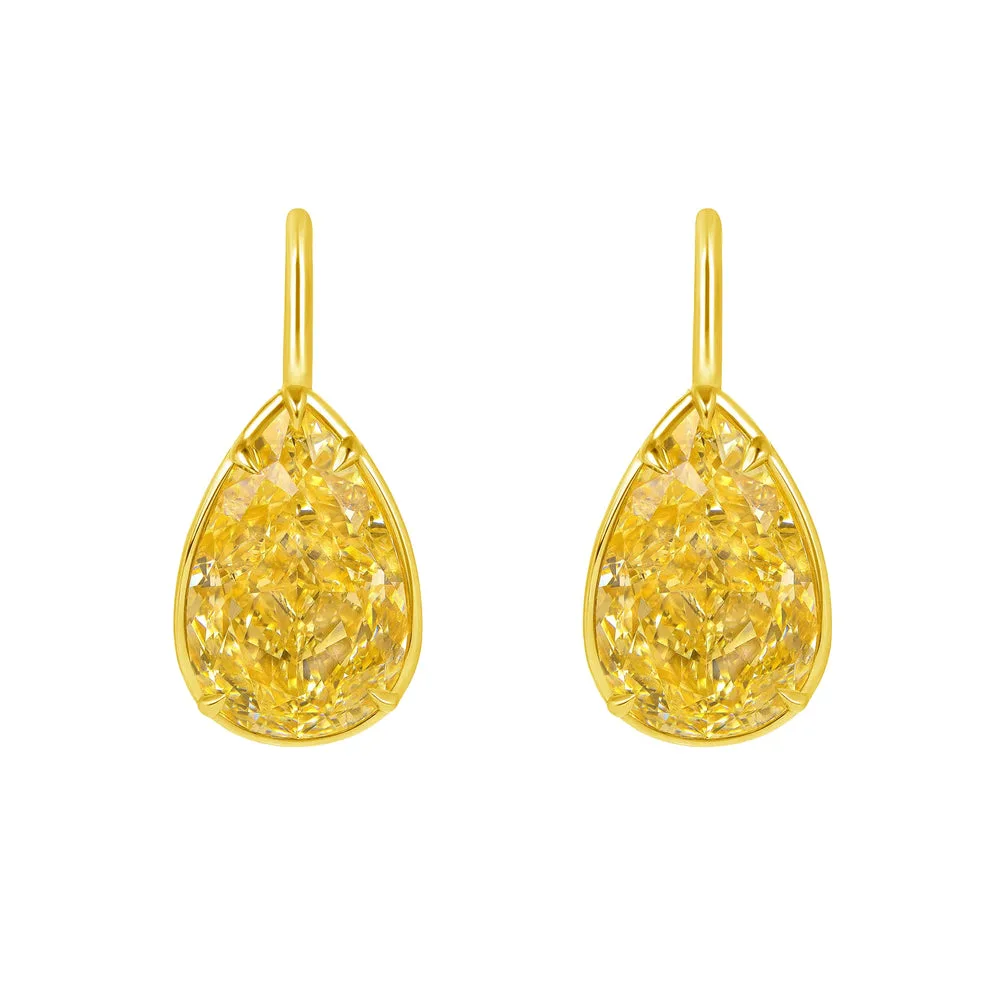 Zendaya Closes Schiaparelli, and Gold Becomes Couture 4. Fancy yellow pear diamonds bezel set in yellow gold dangle earrings, closeup