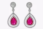 2.20 Carats Pear Shaped Ruby & Diamond Double Halo Dangle Earrings in White Gold
