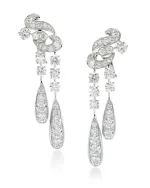 Pair of Diamond Earrings Each Designed As a Swirled Surmount Suspending Two Lines of Brilliant-cut Diamonds on Knife Edg