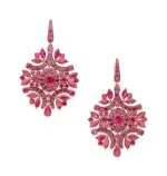 Pair of Ruby Earrings, Suspending Clusters of Oval, Pear and Marquise-shaped Rubies, Accented by Lines of Round Rubies