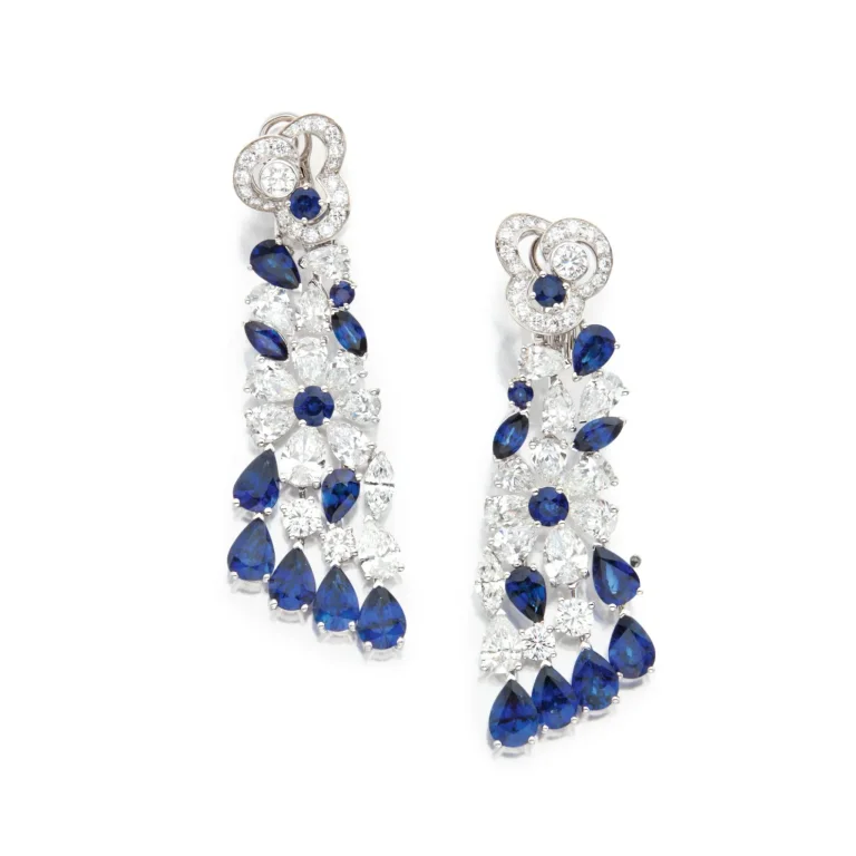 Pair of Sapphire and Diamond 'nuage Flower' Pendant-earclips of Stylized Floral Design, Set with Pear, Marquise-shaped a