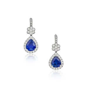 Pair of Sapphire and Diamond Pendant-earrings, France Centering Two Pear-shaped Sapphires, Framed and Accented by Round