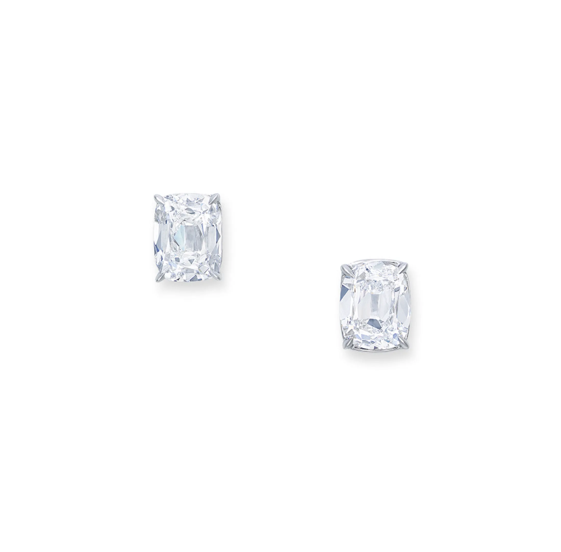 Rare diamond earrings pairing an old mine brilliant with a cushion brilliant, five carats each