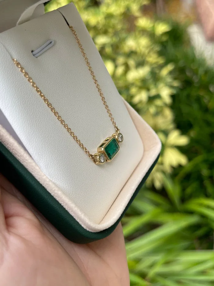 2.77tcw 14K Gold 3 Stone East-West Set Emerald & Round Cut Diamond Side Stones Bezel Necklace