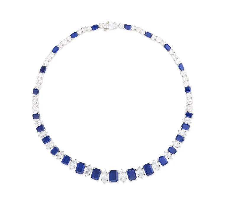 40 carats SAPPHIRE AND DIAMOND NECKLACE Twenty-five octagonal step-cut sapphires of 4.70 to 0.73 carat, marquise-cut and