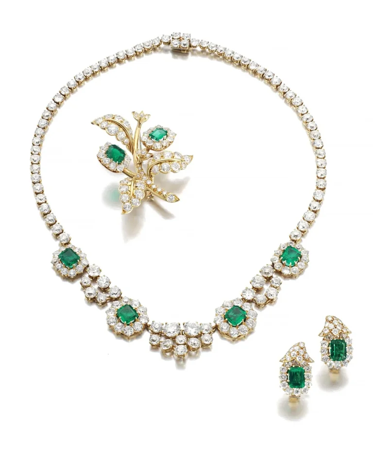 45 carats Pair of emerald and diamond ear clips, , a necklace and a brooch |
