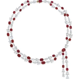 70 carats IMPORTANT RUBY AND DIAMOND NECKLACE, Thirty-five oval-shaped rubies, pear brilliant-cut diamond of 2.17 and 1.