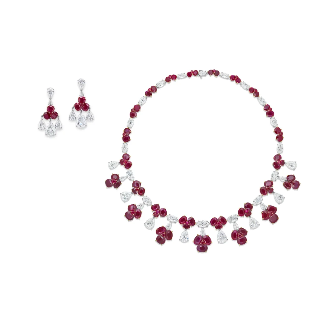 AN EXQUISITE SET OF RUBY AND DIAMOND JEWELLERY Oval and antique cushion brilliant-cut rubies, variously-cut diamonds, go
