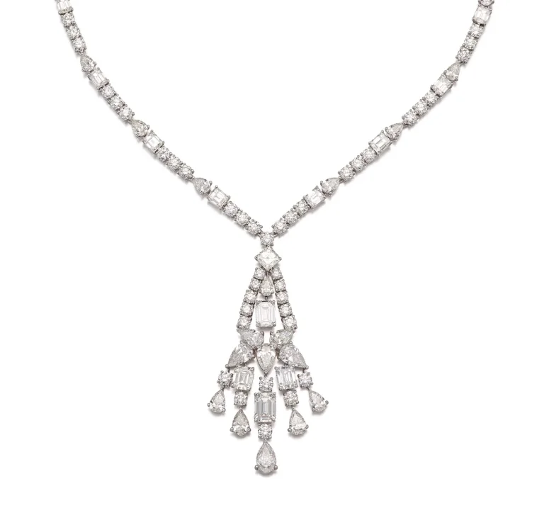 DIAMOND PENDENT NECKLACE| Of chandelier design, set with pear-shaped, emerald- and brilliant-cut diamonds. Four emerald-