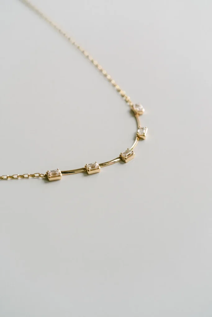 Emerald Cut East-West Diamond Gallery Necklace