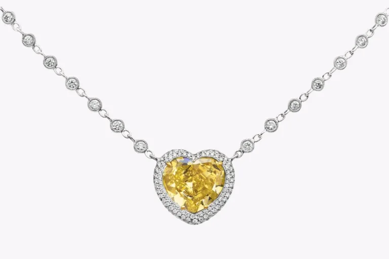7.77 Carats Heart Shape Yellow Diamond Pendant Necklace in Two-Tone Gold