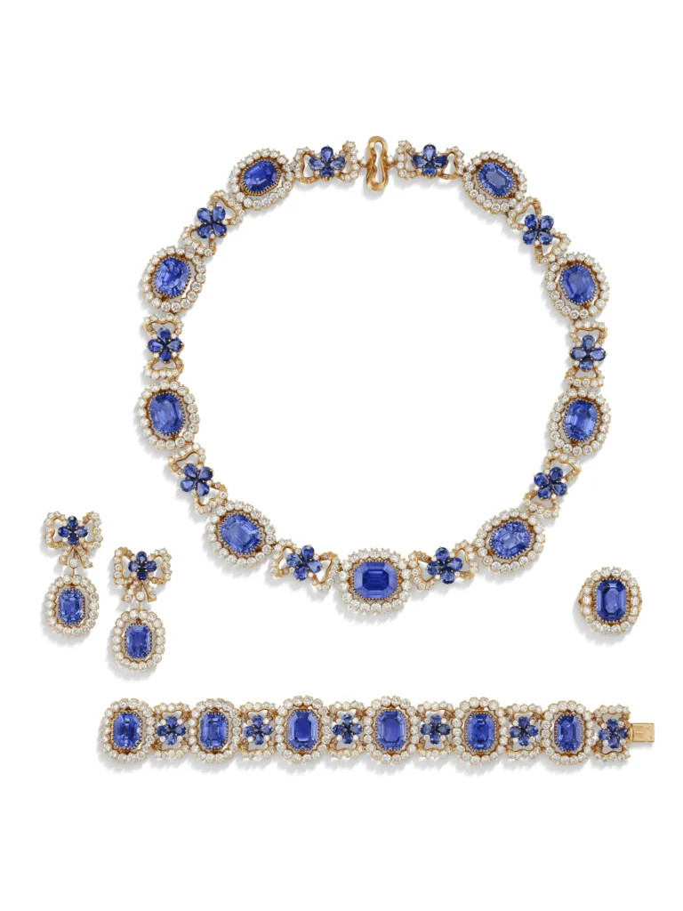 IMPRESSIVE SUITE OF SAPPHIRE AND DIAMOND 'NŒUD' JEWELLERY Comprising a necklace, a bracelet, a pair of earrings and a ri