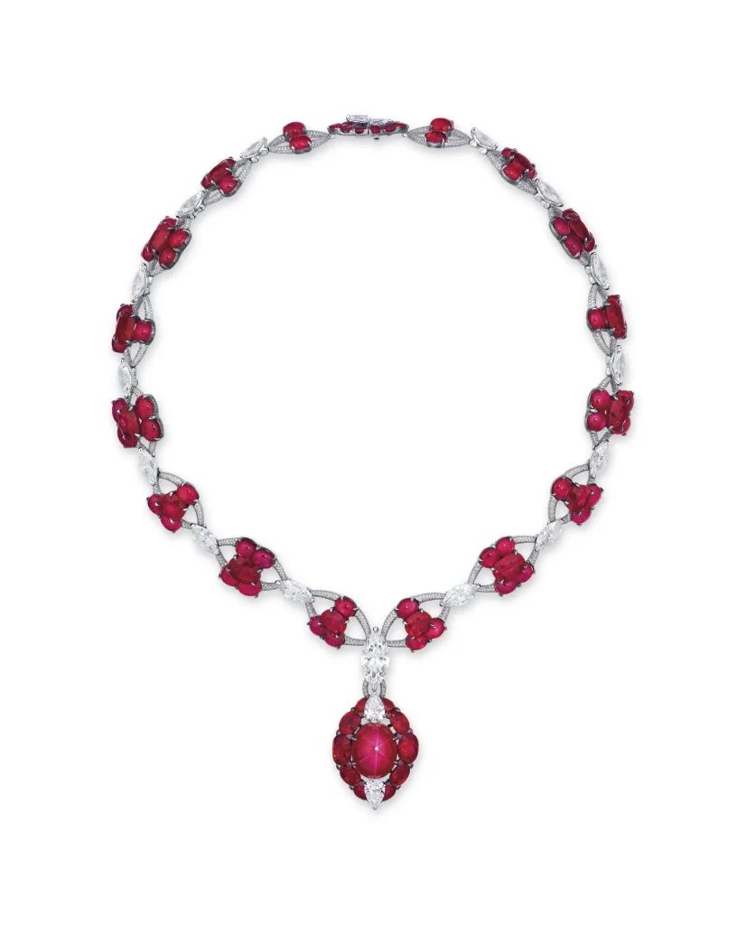 MAGNIFICENT STAR RUBY AND DIAMOND NECKLACE, ETCETERA Oval cabochon star ruby of 19.53 carats, oval cabochon rubies, oval