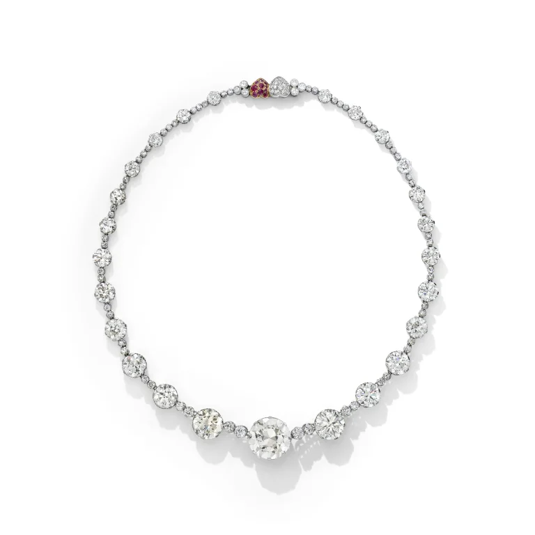 MID-20TH CENTURY DIAMOND AND RUBY RIVIÈRE NECKLACE Circular brilliant-cut diamond of 11.91 carats, round and single-cut
