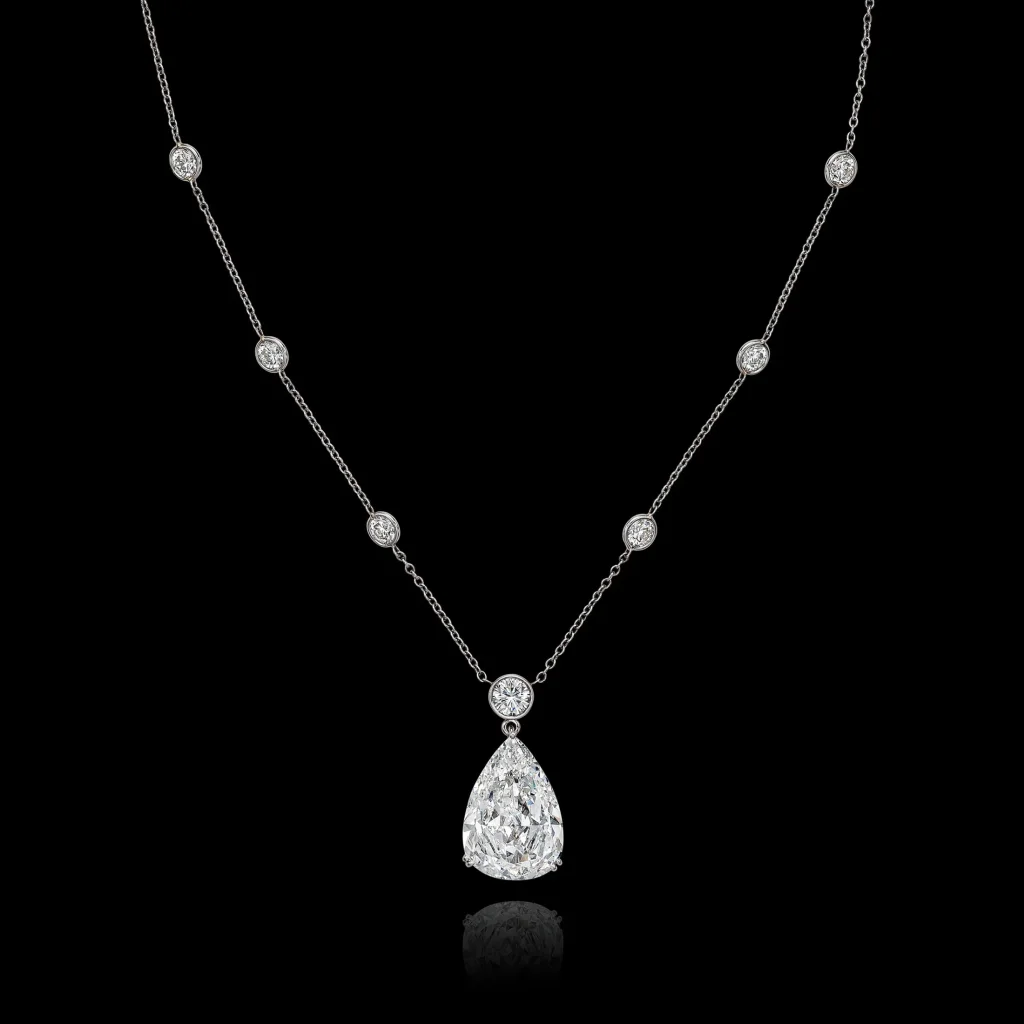 PENDENT NECKLACE Pear brilliant-cut diamond of 5.03 carats, round diamonds, platinum