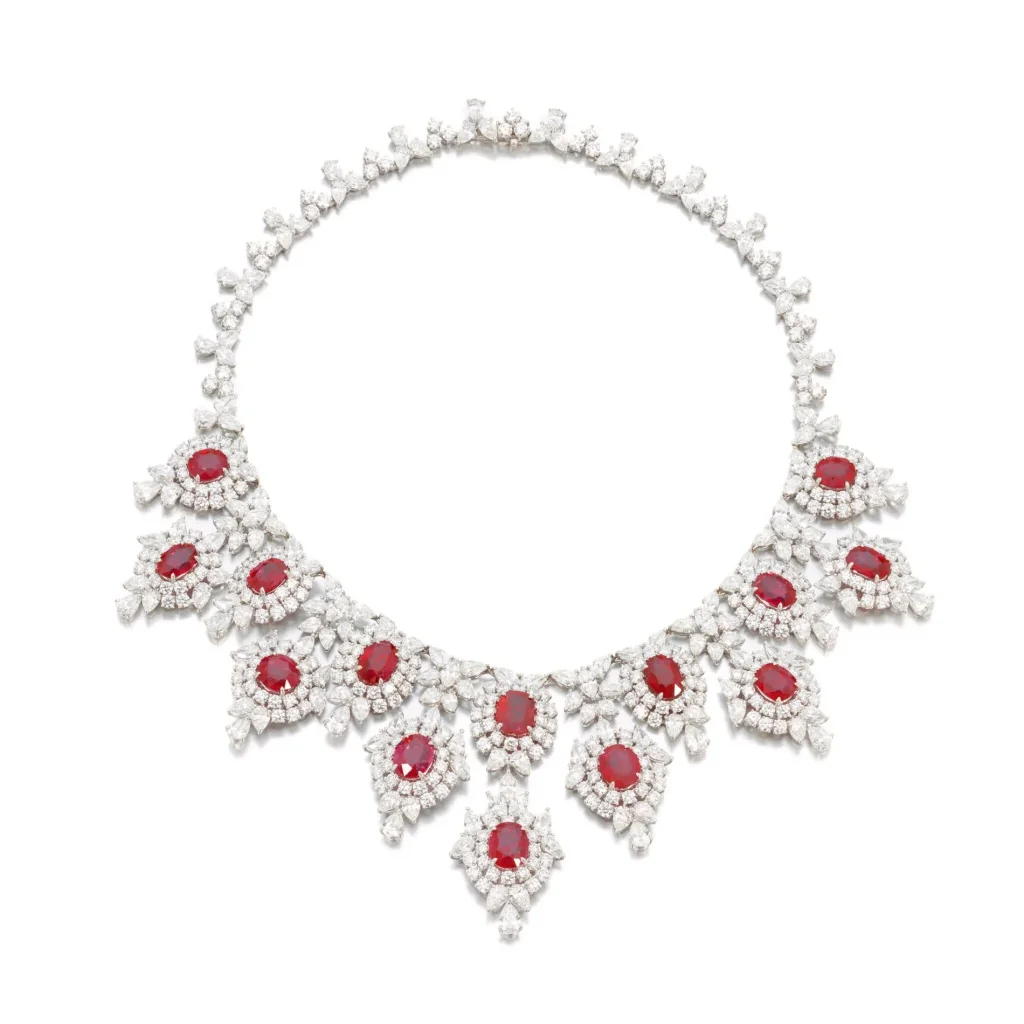 Rare and Important ruby and diamond necklace The front set with oval, cushion-shaped and round rubies, set throughout wi