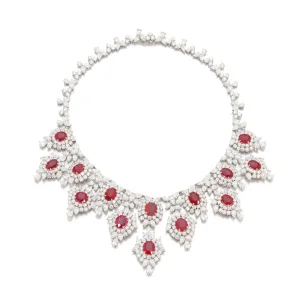 Rare and Important ruby and diamond necklace The front set with oval, cushion-shaped and round rubies, set throughout wi