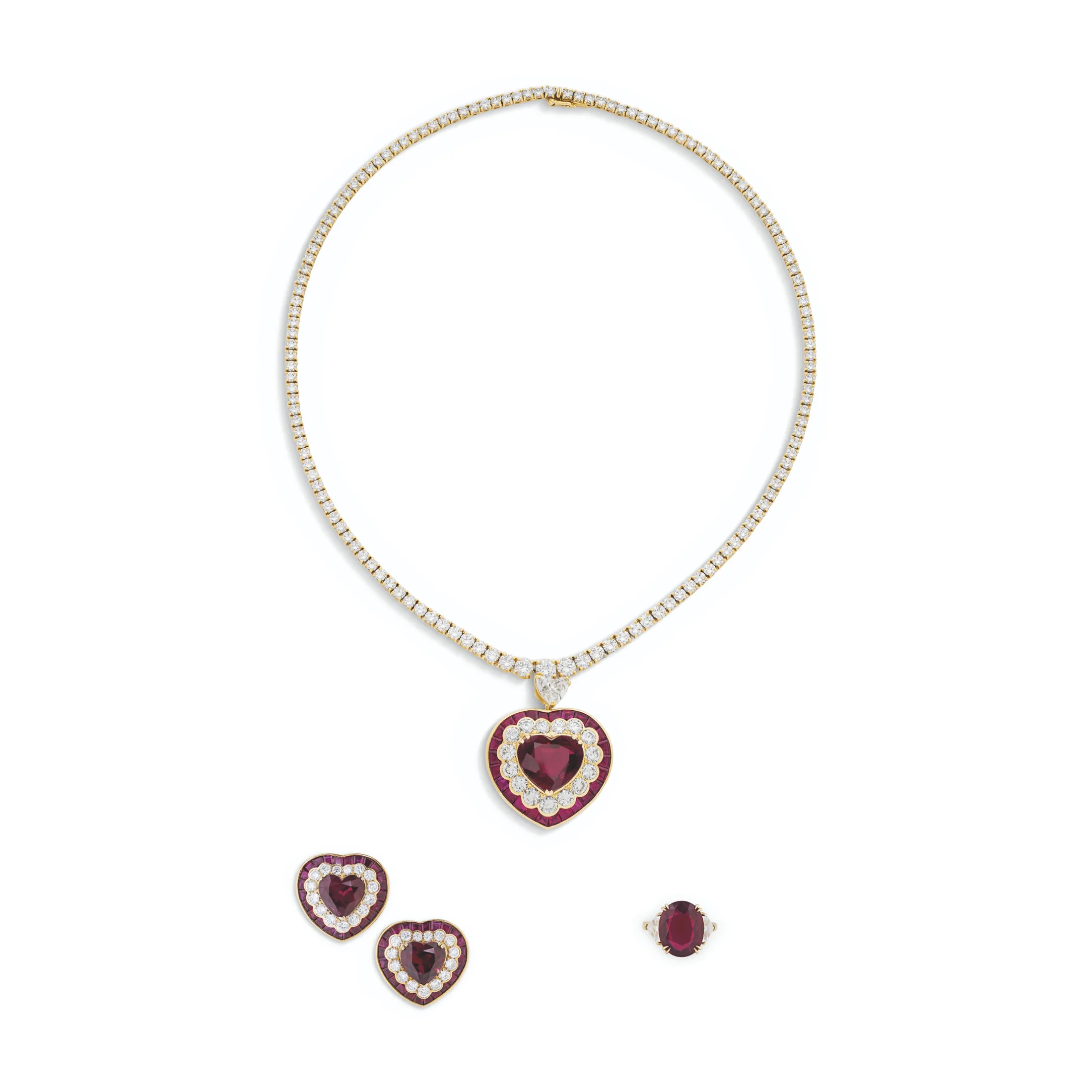 RUBY AND DIAMOND NECKLACE, EARRING AND RING SUITE Heart-shaped rubies of 14.12, 5.20 and 4.22 carats, oval-shaped ruby o